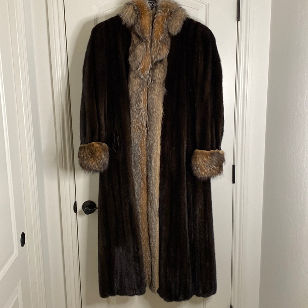 Custom design full length mink coat. Size is large. Reversible rain coat w/belt.